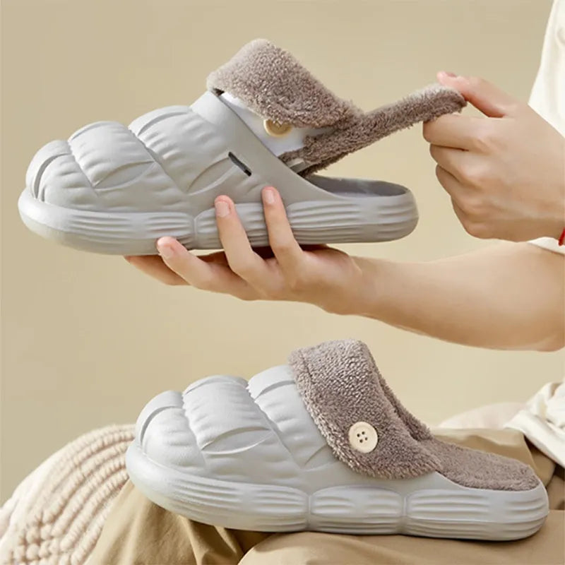 Removable fluffy slippers in beige with faux fur lining and Velcro fastening on a wooden floor