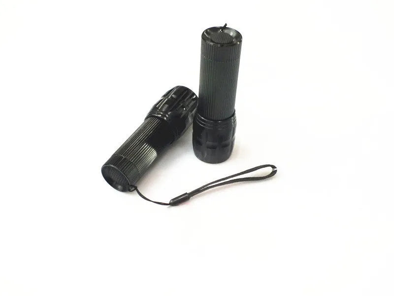 Black mini LED flashlight with telescopic head and tail push button switch, head diameter 3.1 cm
