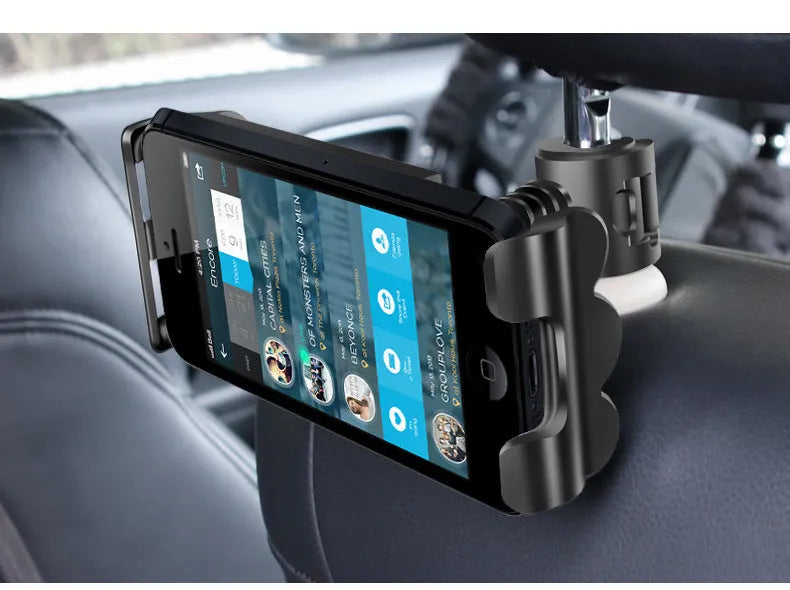 Car headrest mounting bracket holding tablet with 360-degree rotation adjustment