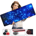 Blue star mouse pad with high-density fabric surface and anti-skid natural rubber base on a desk