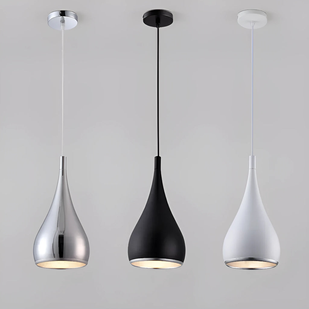 Minimalist iron pendant chandelier with three black lamp heads on a long disc fitting.