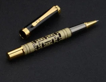 Yellow bronze metal fountain pen with iridium nib and 0.7mm big tip on white background