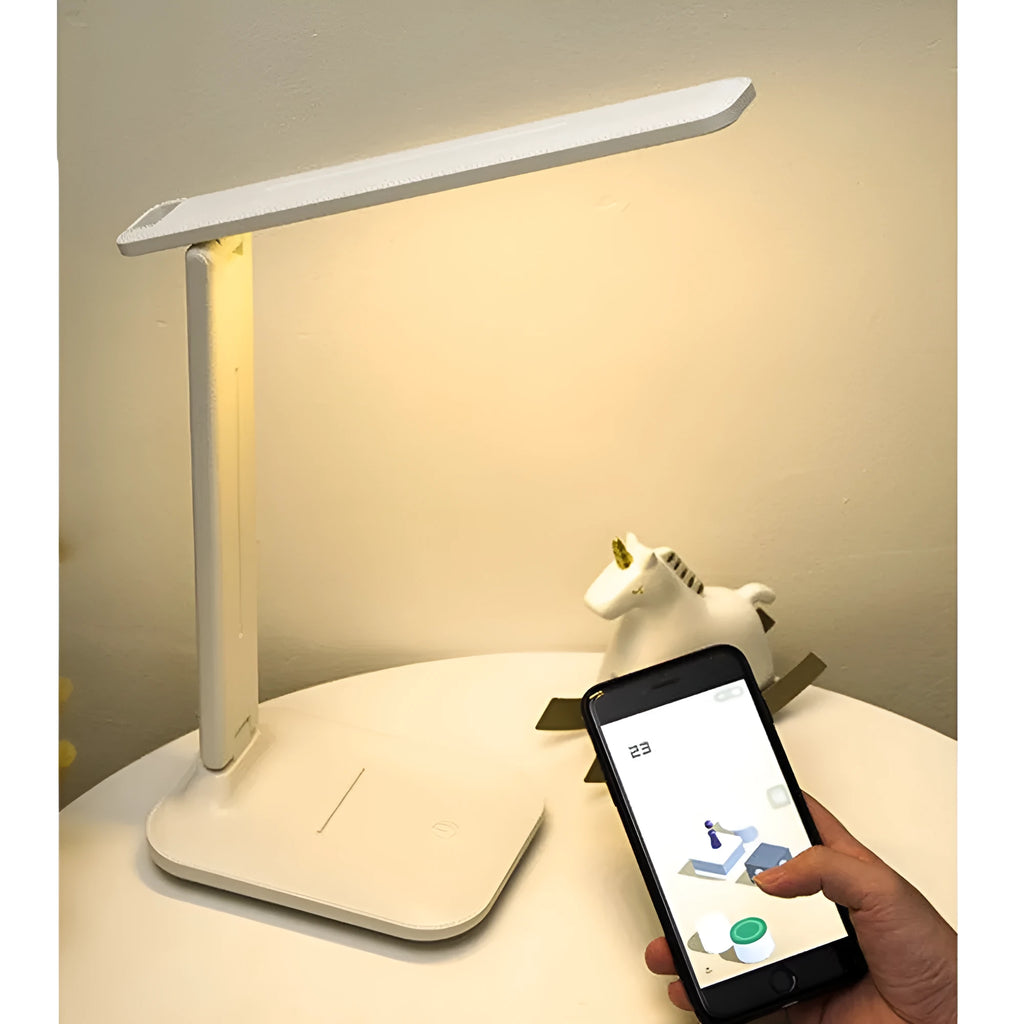 White plastic bedside lamp with touch dimming and USB charging port.
