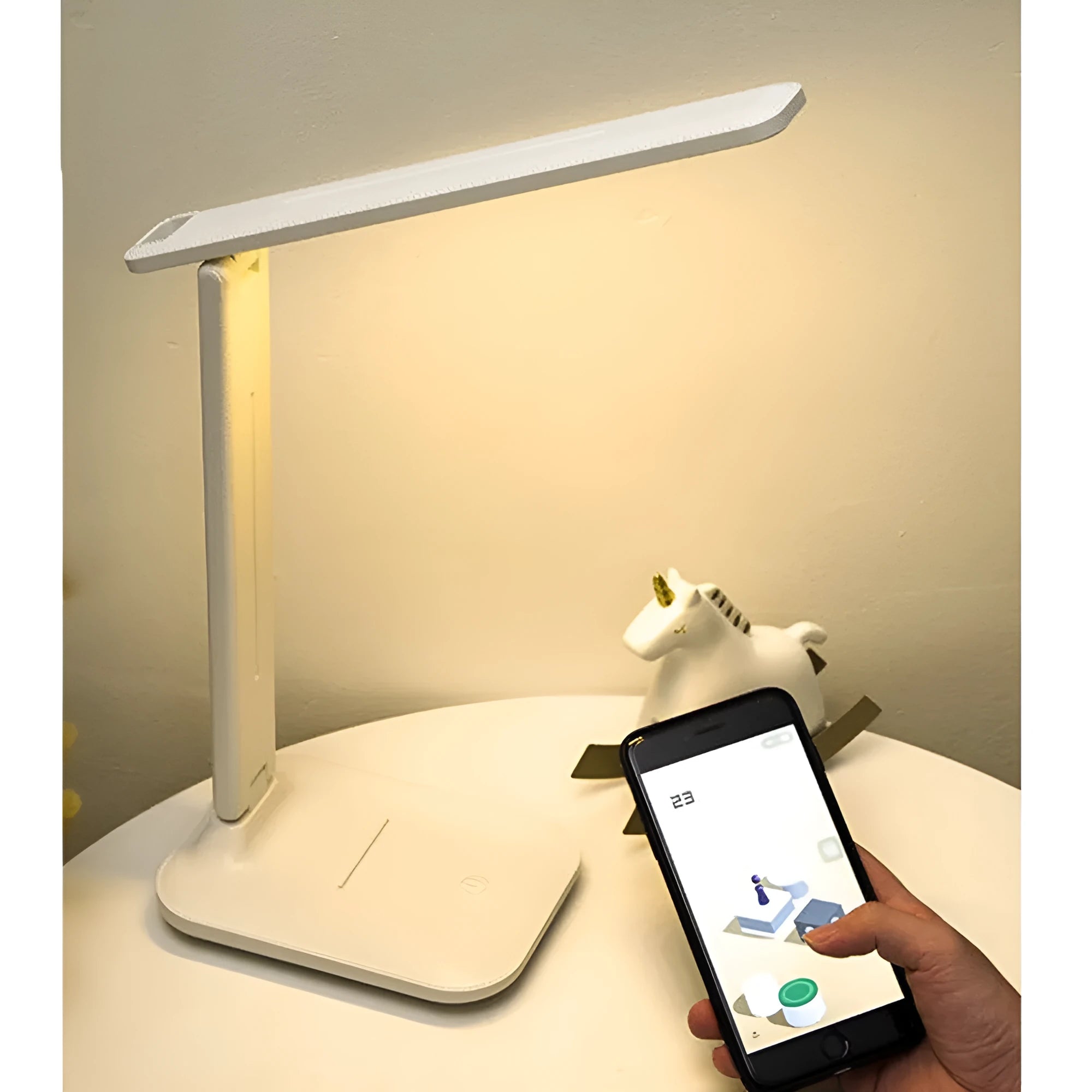 White plastic bedside lamp with touch dimming and USB charging port.