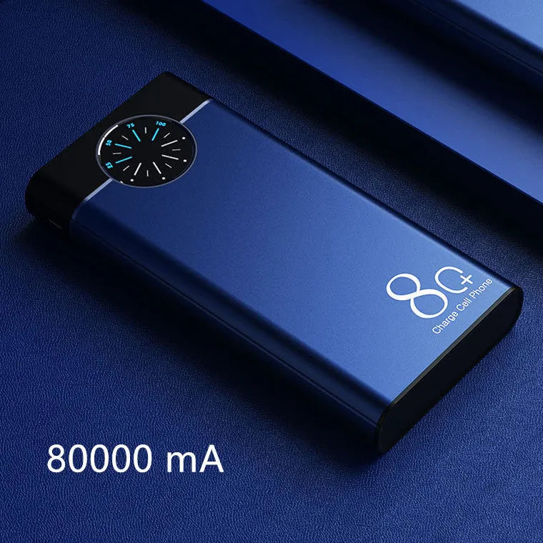 Black 20000mAh alloy portable power bank with LED flashlight showing size scale