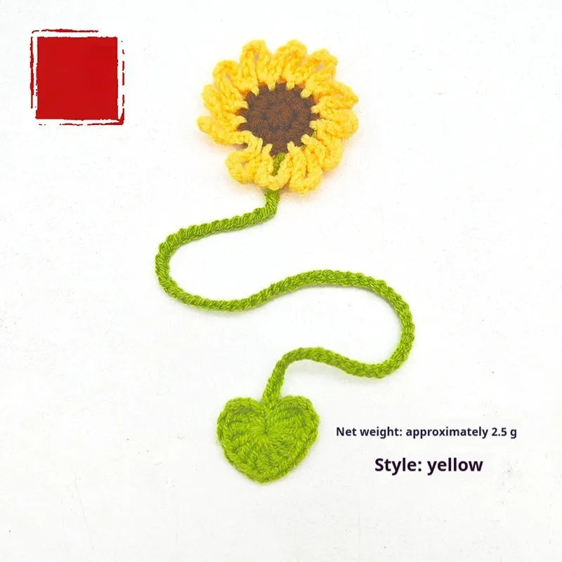 Hand-crocheted daisy bookmark with flexible wire in yellow, showing texture and charm detail.