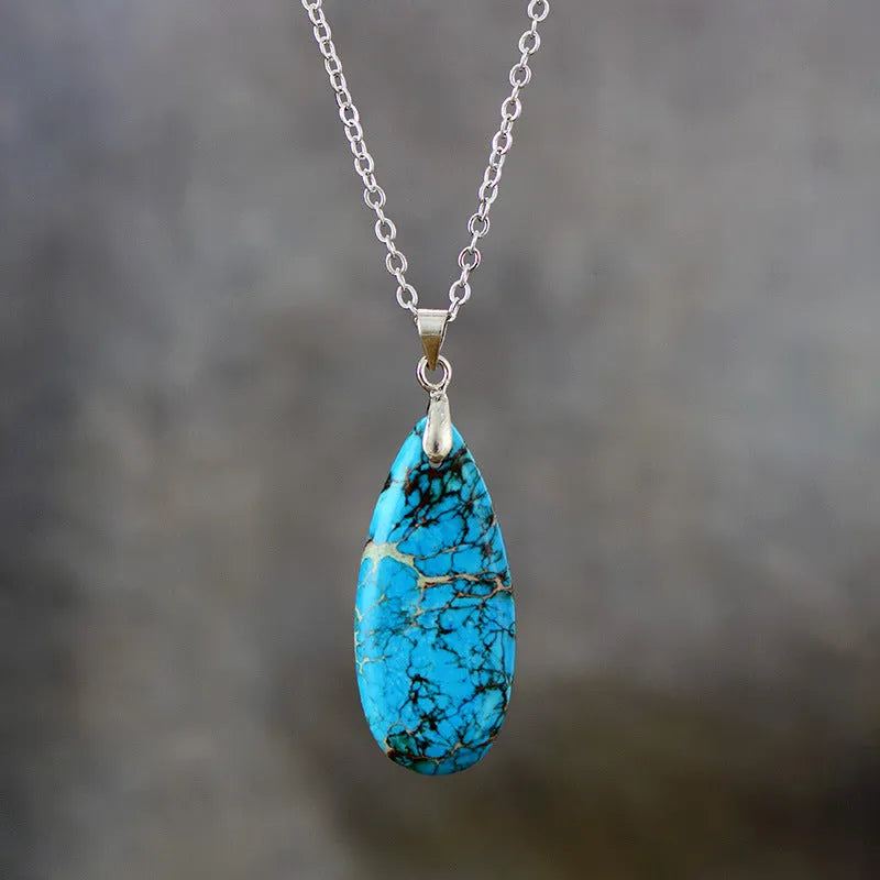 Emperor Stone water drop shaped jade pendant necklace with 18K gold plating on a chain.