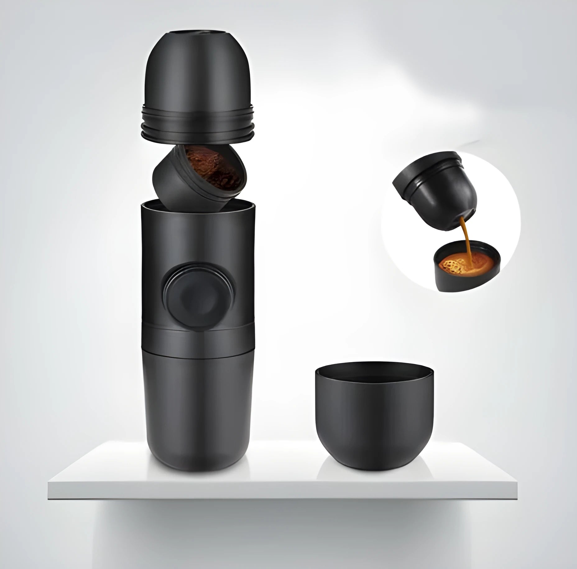 Black portable manual coffee machine measuring 6cm by 17.5cm on a table