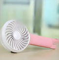 Blue USB rechargeable portable desk fan with 200mm blades and LED light on a wooden desk