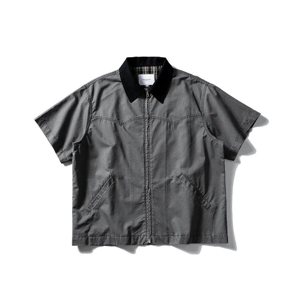 Grey washed cotton short sleeve overall shirt on a hanger, loose fit.