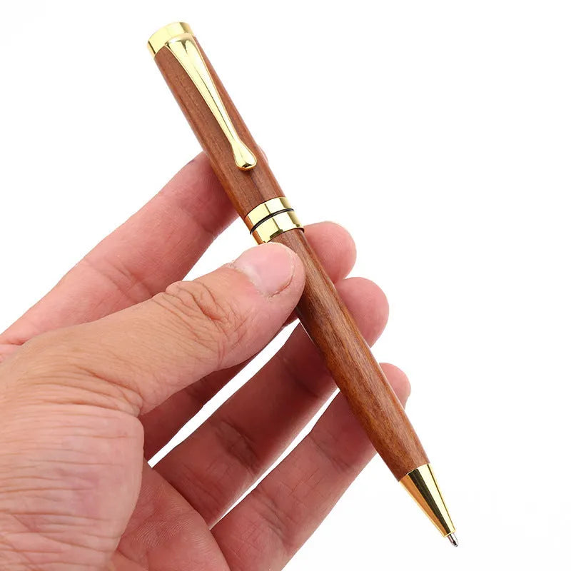 Rosewood and metal ballpoint pen 14cm long with gold and silver finish options on a white background