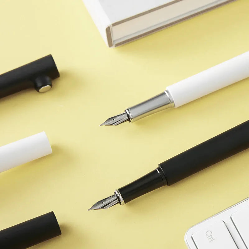 Branch Magnet fountain pen with clear tip showing ink level, stainless steel nib