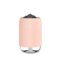 Mini USB ultrasonic humidifier 260ml with night light in turquoise green on a desk