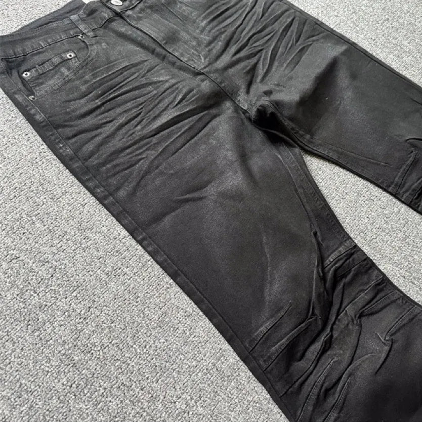 Retro black wax coating washed loose fit men's jeans with mid waist and zip fly