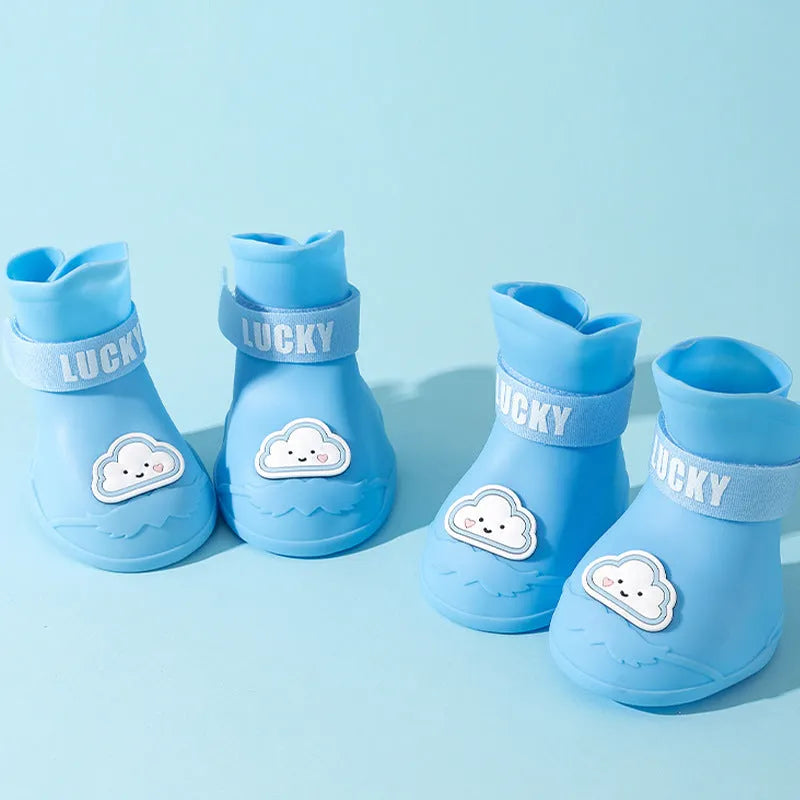 Pack of four silicone waterproof dog booties with non-slip sole in multiple colours on white background
