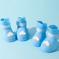 Pack of four silicone waterproof dog booties with non-slip sole in multiple colours on white background