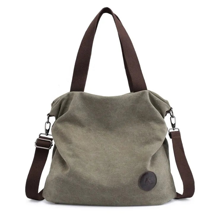 Korean casual canvas bag with square vertical shape, texture canvas, car suture detail, and plain pattern in blue.