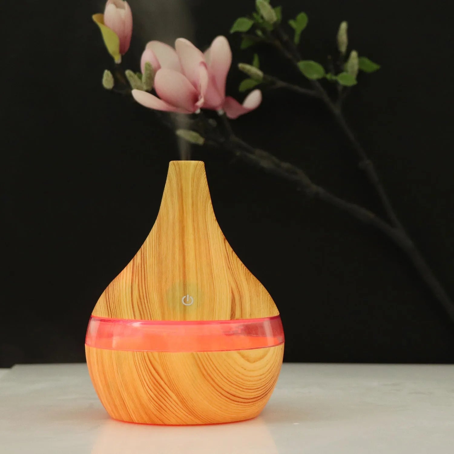 USB mini air purifier humidifier with wood grain finish in columnar shape for small rooms.