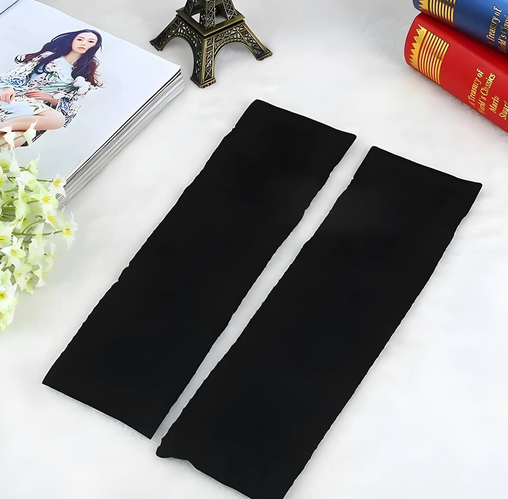 Pair of nylon leg shaping belt compression sleeves in black and skin colour, middle calf length, free size