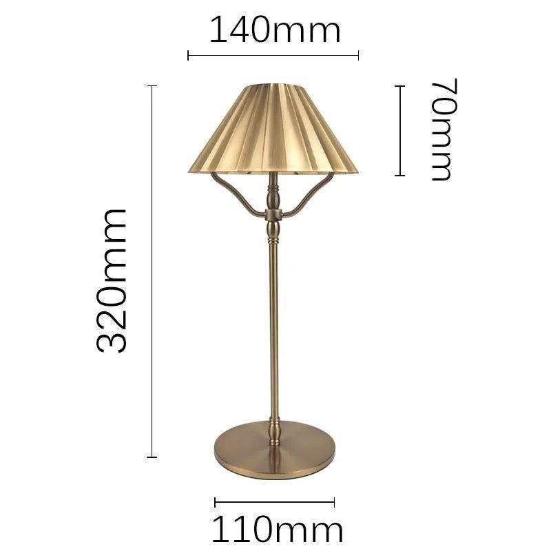 Gold-coloured alloy rechargeable desk lamp with USB-C port and touch dimming switch.