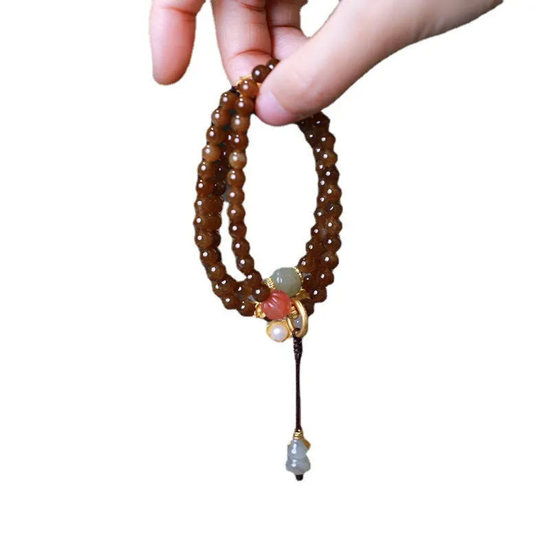 Brown jade Hetian jade three-ring bracelet with butterfly gourd pearl design and silver plated accessories
