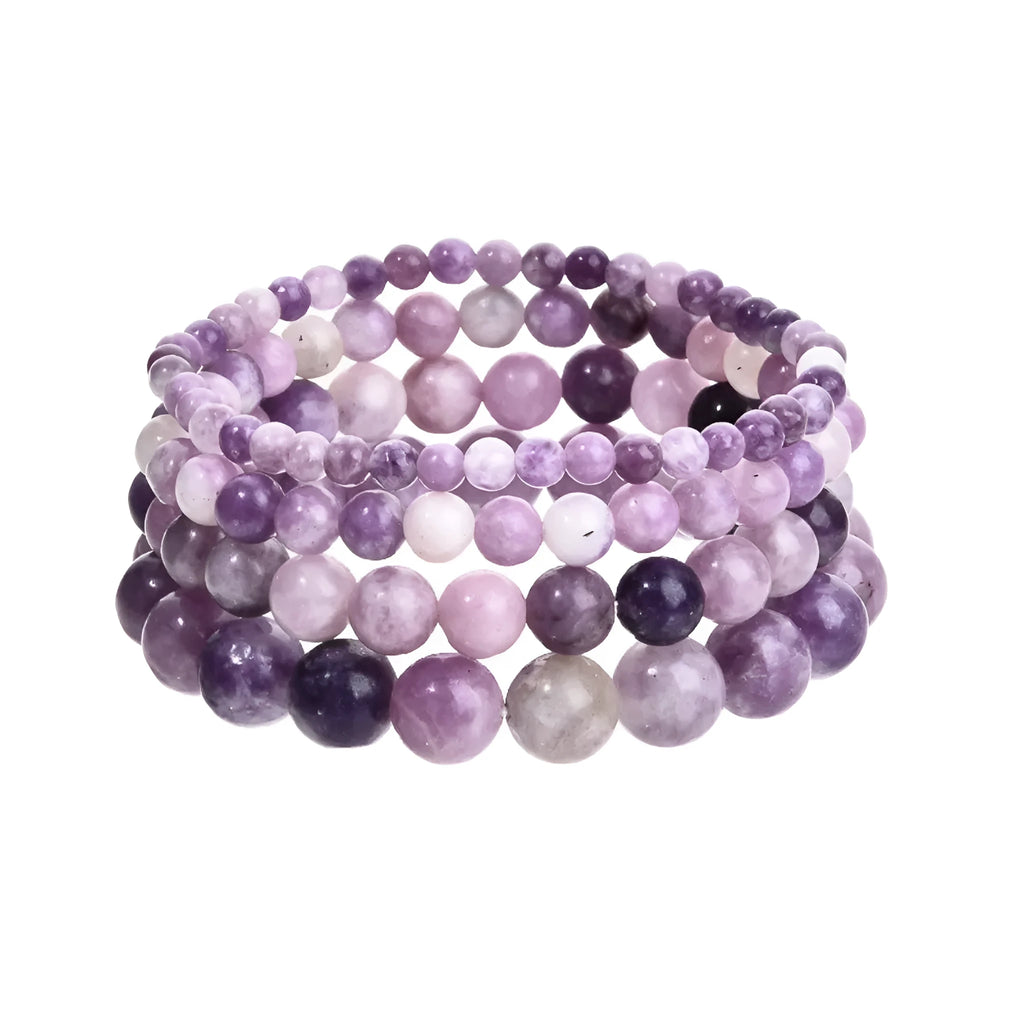 Purple natural stone elastic bead bracelet with geometric beads on wrist