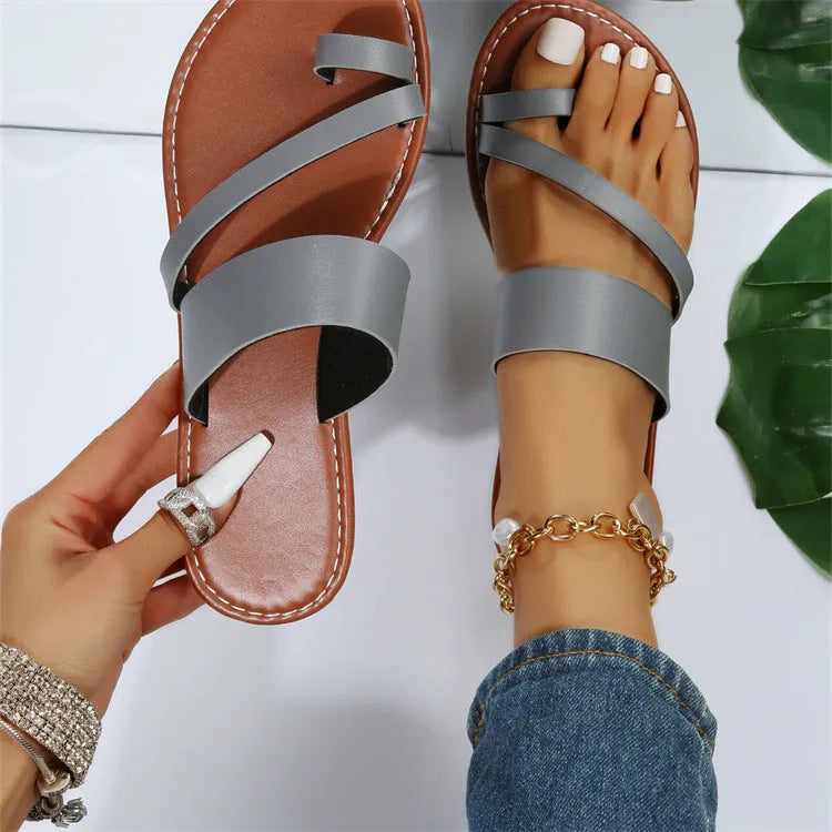 Women's flat thong sandals with artificial PU upper and rubber sole, solid colour, sizes 36-43