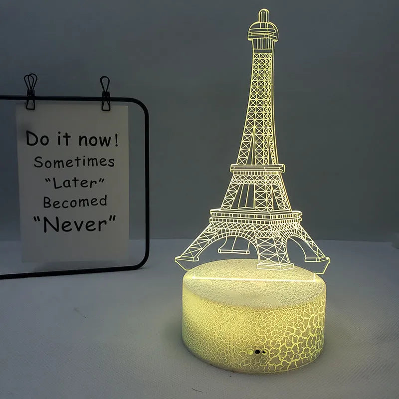 Eiffel Tower themed table lamp with multicolour LED glow on a acrylic shade.