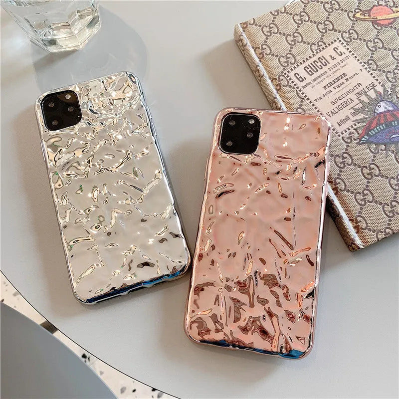 Electroplated rose gold TPU phone case for iPhone, showing precise camera and port cutouts.