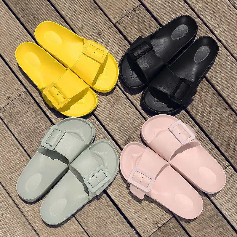 Women's grey blue EVA flip-flop sandals with a buckle strap on a white background.