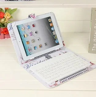 Black wireless Bluetooth keyboard integrated into a protective case for a mobile phone.