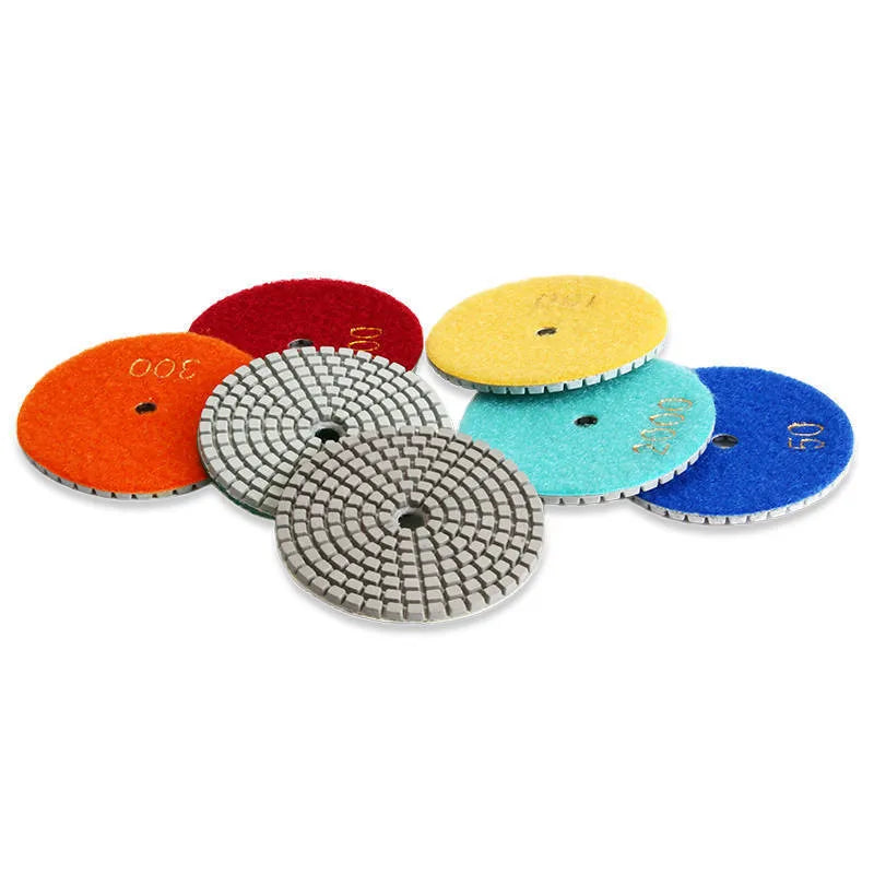 Set of 10 emery stone polishing pads with 80mm diameter and grits from 50 to 3000 mesh.