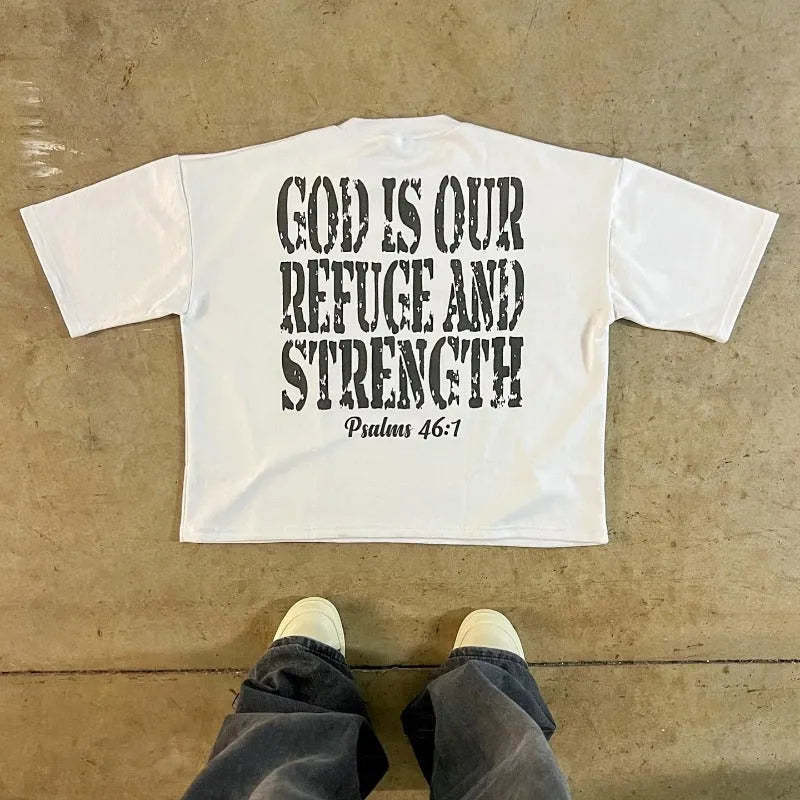 Printed short-sleeve cotton t-shirt with drop-shoulder sleeves and a contrast colour graphic on the front.