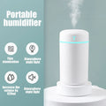 White columnar plastic desktop USB humidifier with single fog outlet for indoor use