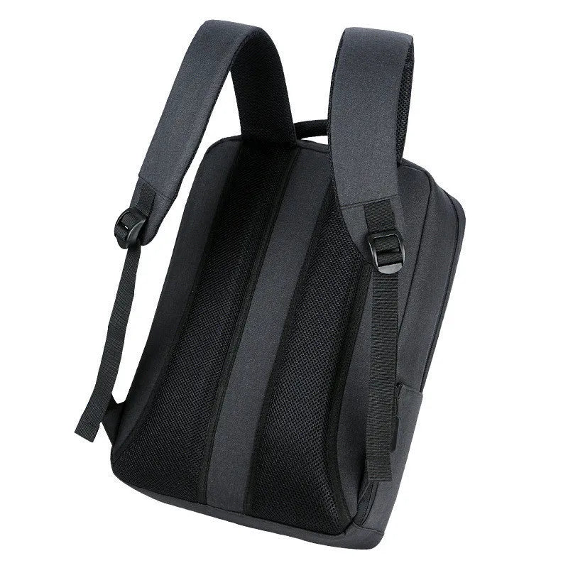 Medium business backpack in black or grey cotton cloth with 20-35L capacity, zipper opening, and multiple internal pockets.