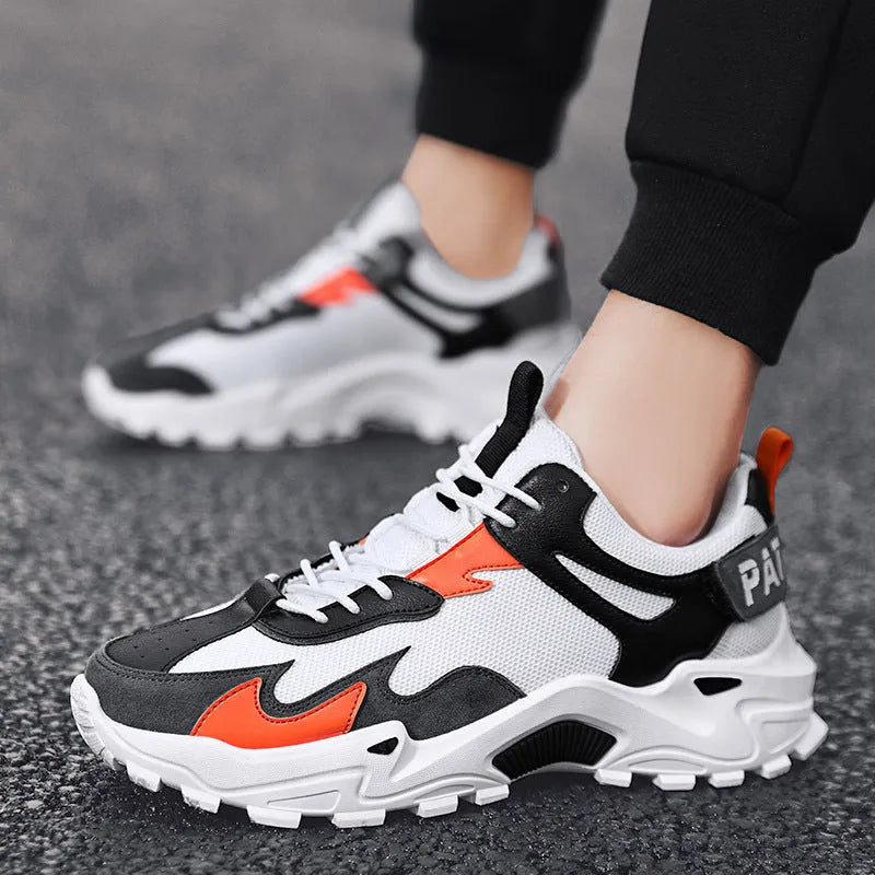 Men's breathable casual sneakers in black white colour-blocked pattern with lace-up front