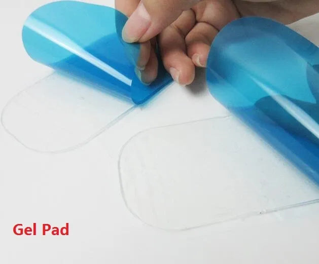 Compact EMS hip muscle training stimulator device with adhesive gel pads for buttocks and abdomen.