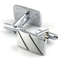 Silver diagonal alloy cufflinks with K9 crystal and matching tie clip on a white background