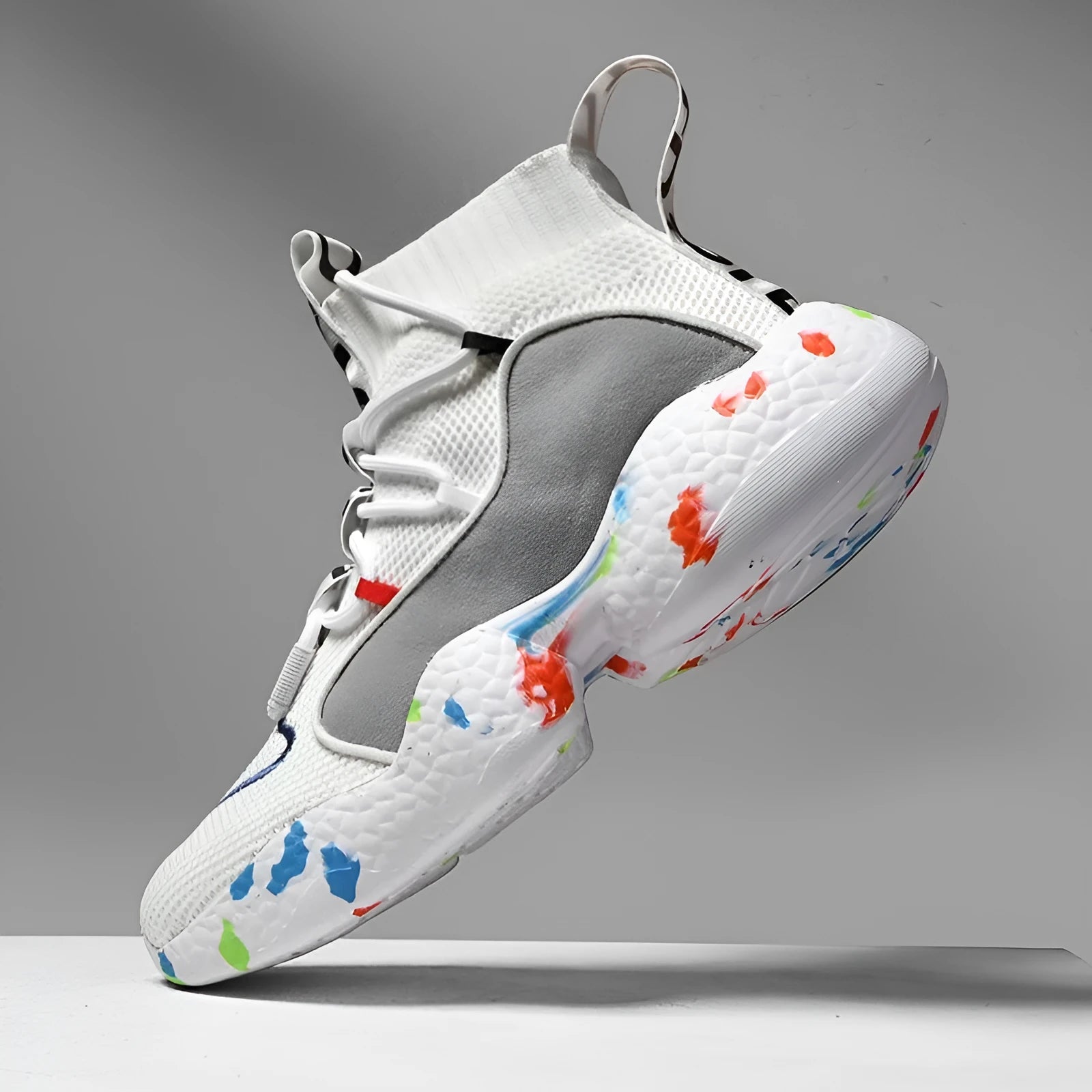 Men's camouflage pattern mesh sneakers with a flat rubber sole on a white background.