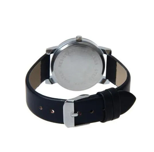 Impressionist watch with sweetheart meridian strap and round analogue dial on a light background