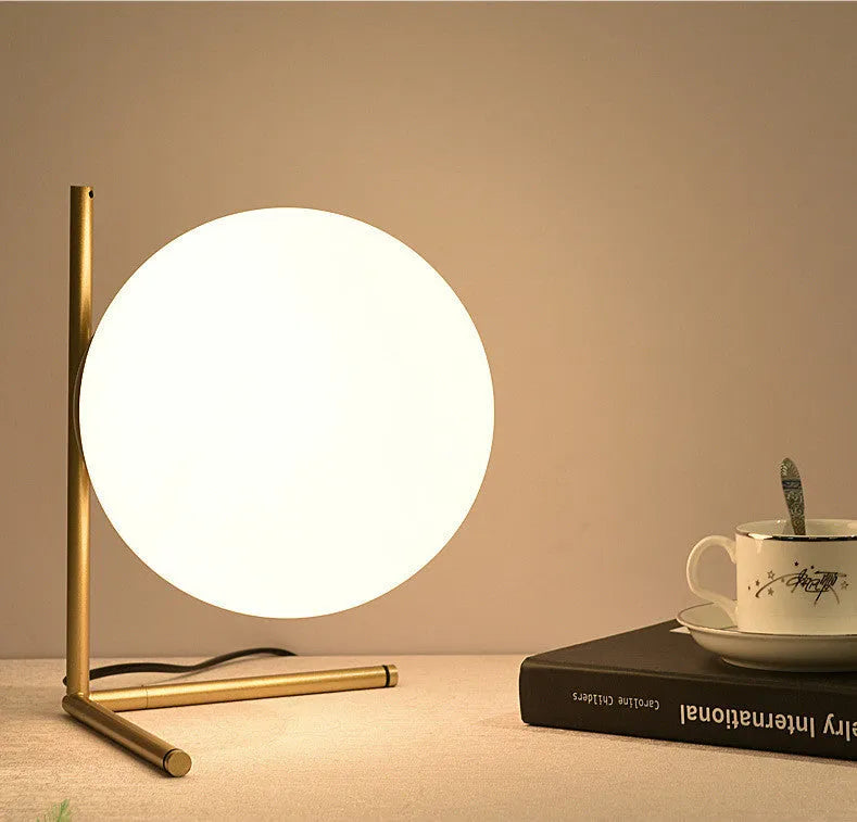 Creative glass shade LED desk lamp in one of three sizes with three-tone light and 1.5 metre cable.