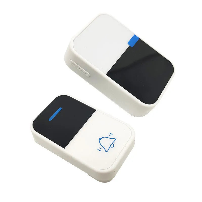 White wireless doorbell kit with self-powered button and receiver showing 150-metre range
