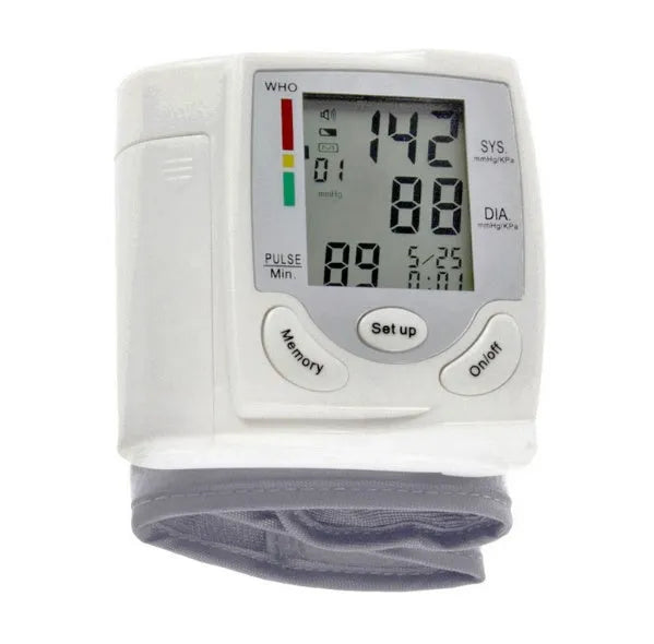 Grey wrist blood pressure monitor with ABS plastic casing showing display and cuff