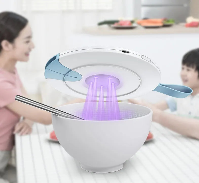 Portable baby bottle steriliser showing compact blue design with USB port and measuring 163.6mm long