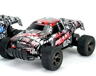 Blue 1:18 scale remote control off-road drift car with 2.4GHz remote on a grey surface.