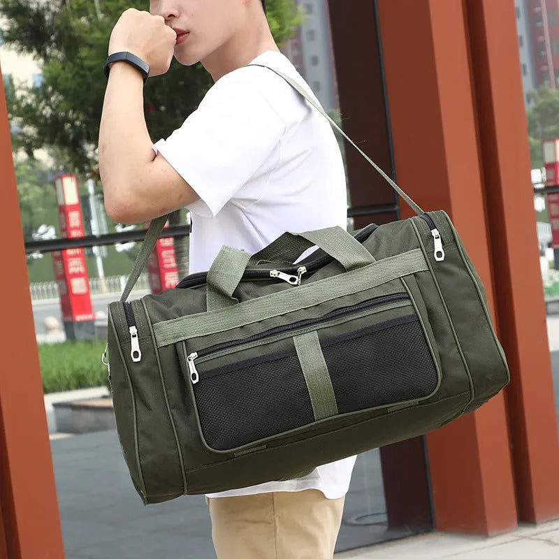 Folding travel bag 56x24x29cm in black with main compartment and front zipper pocket