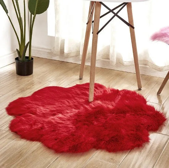 Artificial woolen floral sheepskin hairy plush carpet rug in beige colour, 60x60 cm size, on a tiled floor