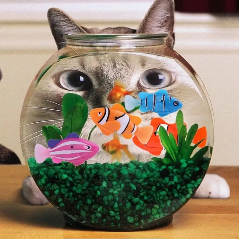 Set of four plastic electronic pet fish toys in red orange pink blue, 8cm, for bath or tank