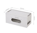 Grey and white plastic wireless router storage box with cable management holes and storage compartments