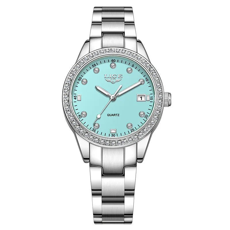 Silver stainless steel women's watch with diamond-encrusted bezel and luminous hands on a 34mm round dial.